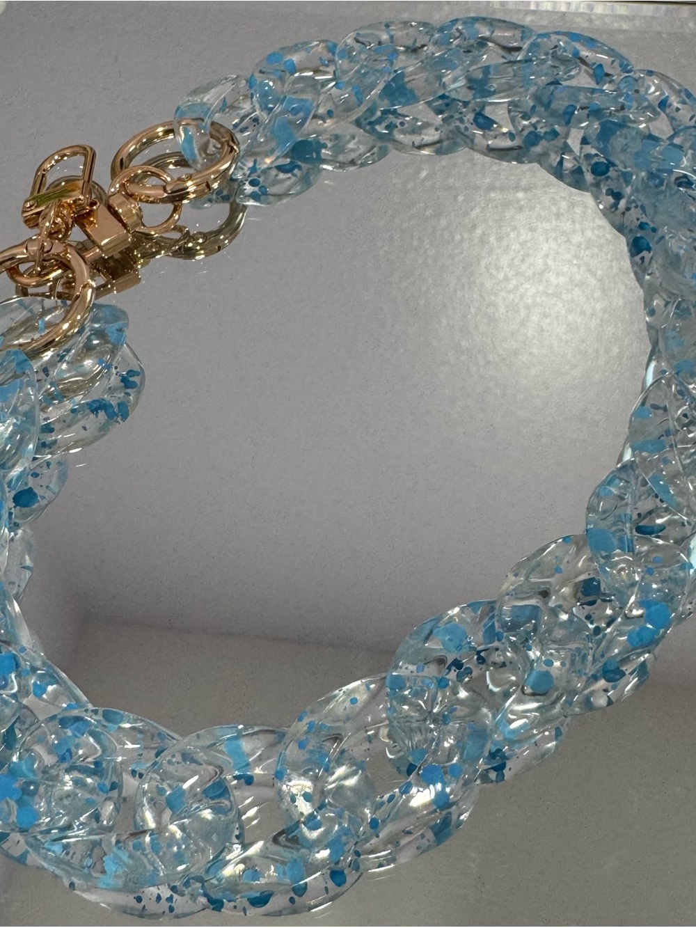 New Clear Acrylic with Blue Speckle and Gold Hardware